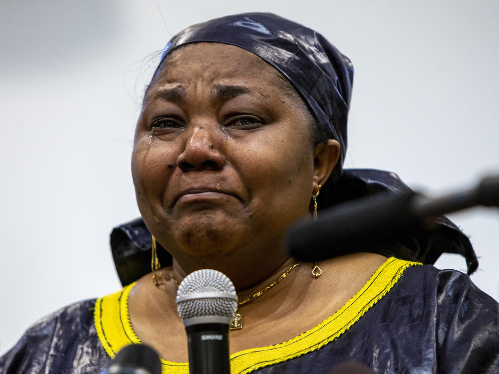 Patrick Lyoya's mother Dorcas Lyoya sheds tears during a news conference at the Renaissance Church of God in Christ Family Life Center in Grand Rapids, Mich., on Thursday.