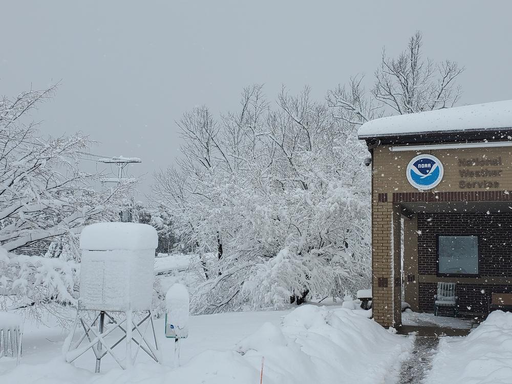 A fast-moving storm dropped over a foot of snow in some areas of New York, including in Binghamton, where the National Weather Service reported a record snowfall.