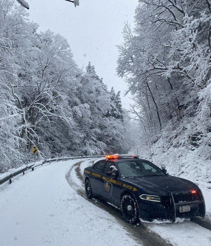 The New York State Police issued warnings to commuters about road conditions following a late spring storm that hit the state overnight.