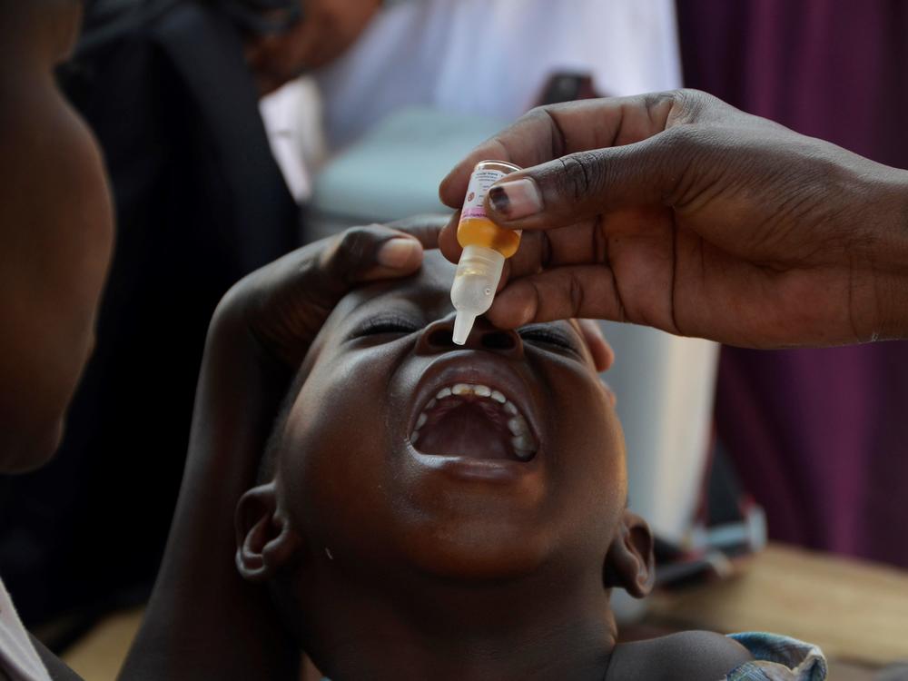 A child receives a polio vaccine in Kampala, Uganda, on Jan. 14, 2022.