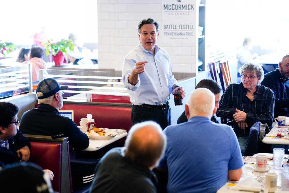 GOP Senate candidate McCormick meets with attendees during a campaign event in York, Pa., on April 4.