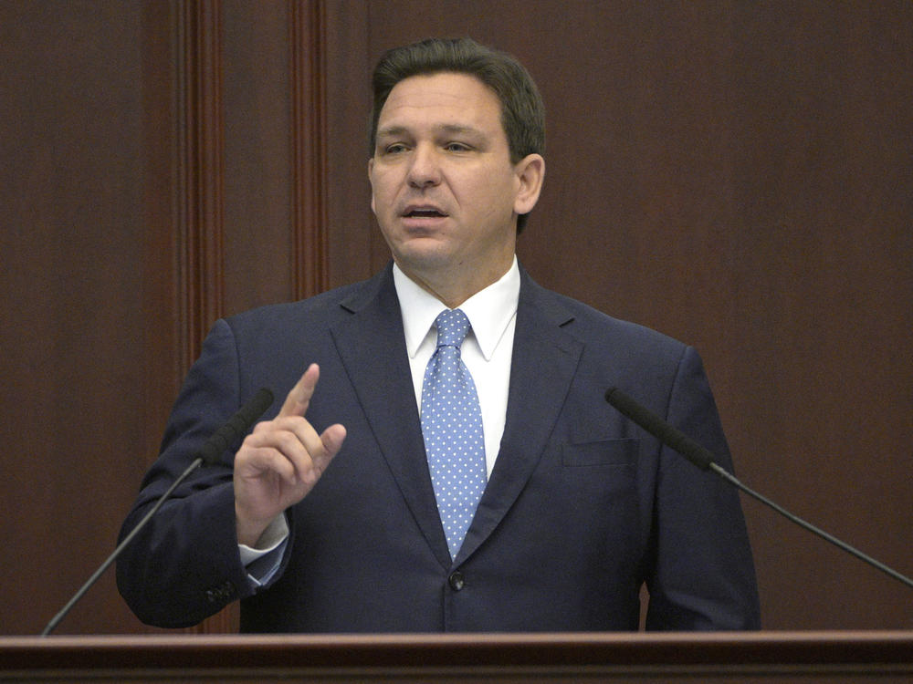 Florida Gov. Ron DeSantis addresses a joint session of a legislative session, Jan. 11, 2022, in Tallahassee, Fla.