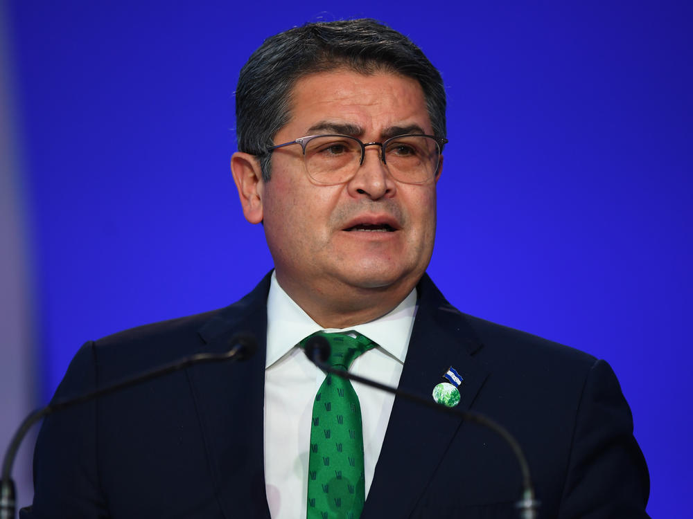 On Nov. 1, 2021, Honduran President Juan Orlando Hernández delivers his national statement during day two of the U.N. Climate Change Conference in Glasgow, Scotland.