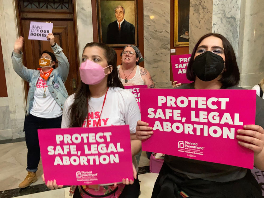 Abortion-rights supporters chant their objections at the Kentucky Capitol on April 13, 2022 in Frankfort, Ky., as Kentucky lawmakers debate overriding the governor's veto of an abortion measure.