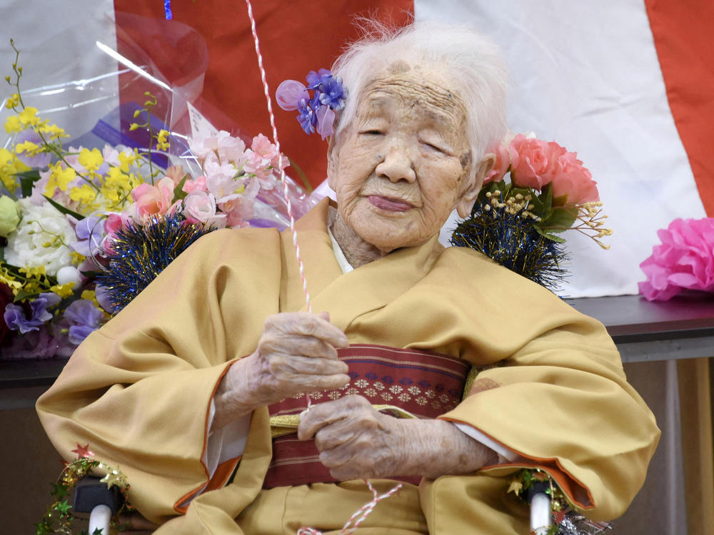 Kane Tanaka, born in 1903, smiles as a nursing home celebrates three days after her 117th birthday in Fukuoka, Japan, on Jan. 5, 2020.