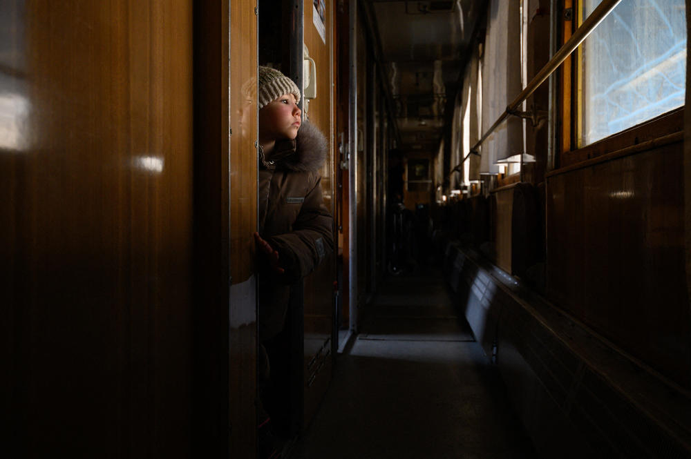 <strong>April 22:</strong> Six-year-old Ioulia sits in an evacuation train to Lviv the day after arriving with a humanitarian convoy from the besieged city of Mariupol, at a railway station in the southern city of Zaporizhzhia.