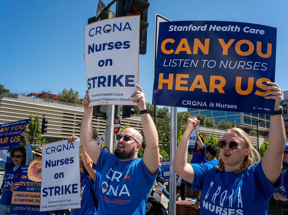 Health care workers during a strike in Palo Alto, Calif., on Monday. About 5,000 nurses at Stanford and Packard Children's Hospital began a strike Monday over a fight for what they describe as fair contracts.