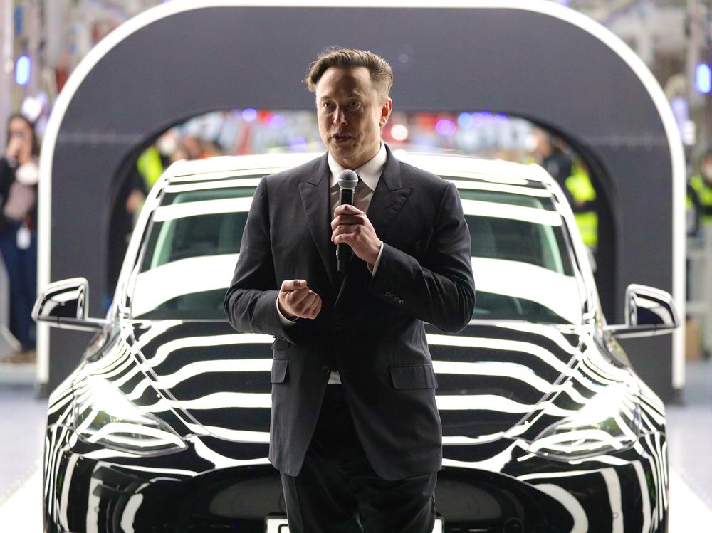 Tesla CEO Elon Musk speaks during the official opening of the new Tesla electric car manufacturing plant near Gruenheide, Germany, on March 22. Tesla shares sank on Tuesday, a day after Twitter accepted a takeover offer from Musk.