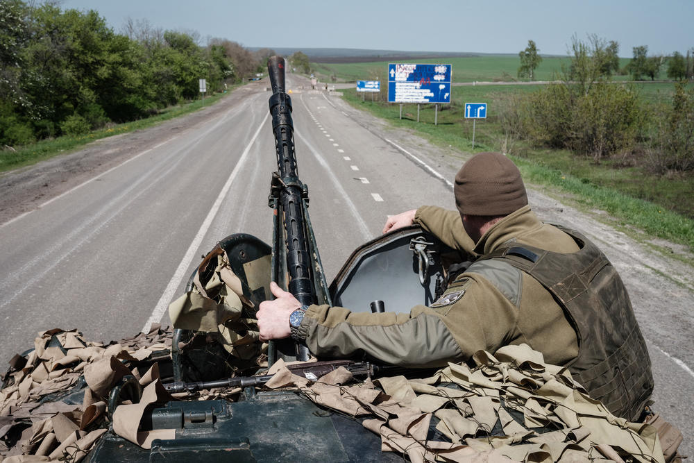 <strong>April 26:</strong> A Ukrainian soldier sits on an armored personnel carrier driving on a road near Sloviansk, a city of more than 100,000 in eastern Ukraine, amid the ongoing Russian invasion.