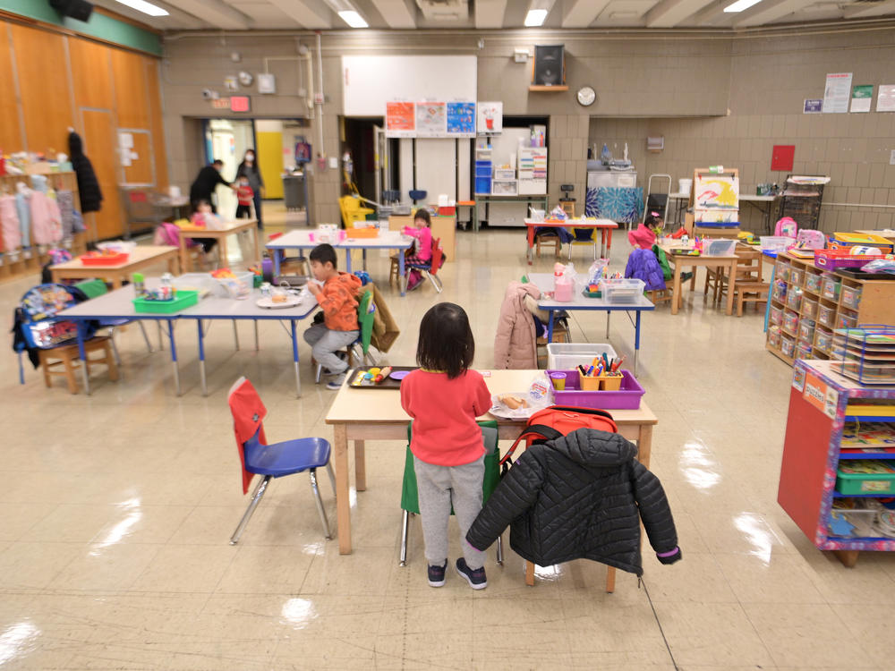 Students attend a pre-K class at P.S. 124 in New York City on Jan 13, 2021. A new report found enrollment drops at state-based preschool programs during the 2020-2021 school year.