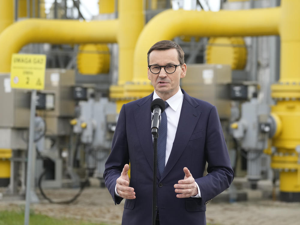 Poland's Prime Minister Mateusz Morawiecki speaks to media at the gas station of Gaz-System in Rembelszczyzna, near Warsaw, Poland, on Wednesday. Polish and Bulgarian leaders accused Moscow of using natural gas to blackmail their countries after Russia's state-controlled energy company stopped supplying the two European nations Wednesday.