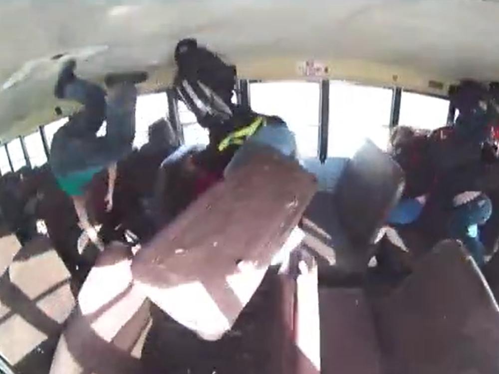 A video aboard the school bus captures the moment a car crashes into the bus during the February incident.
