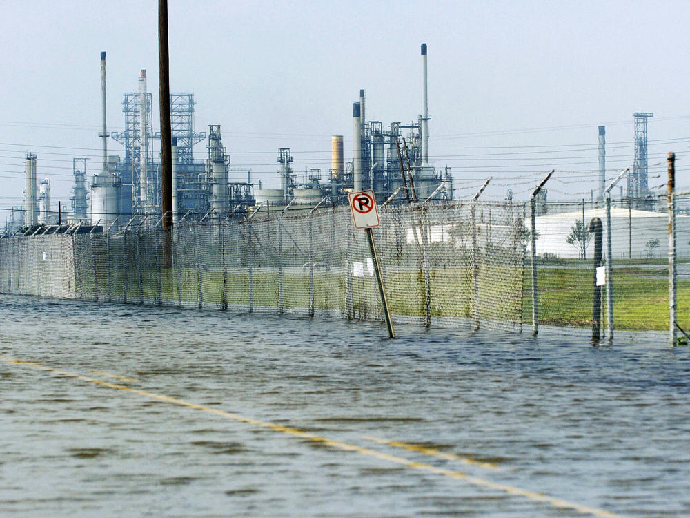 Floodwaters cover an access road to oil refineries in Port Arthur, Texas in the aftermath of 2005's Hurricane Rita.