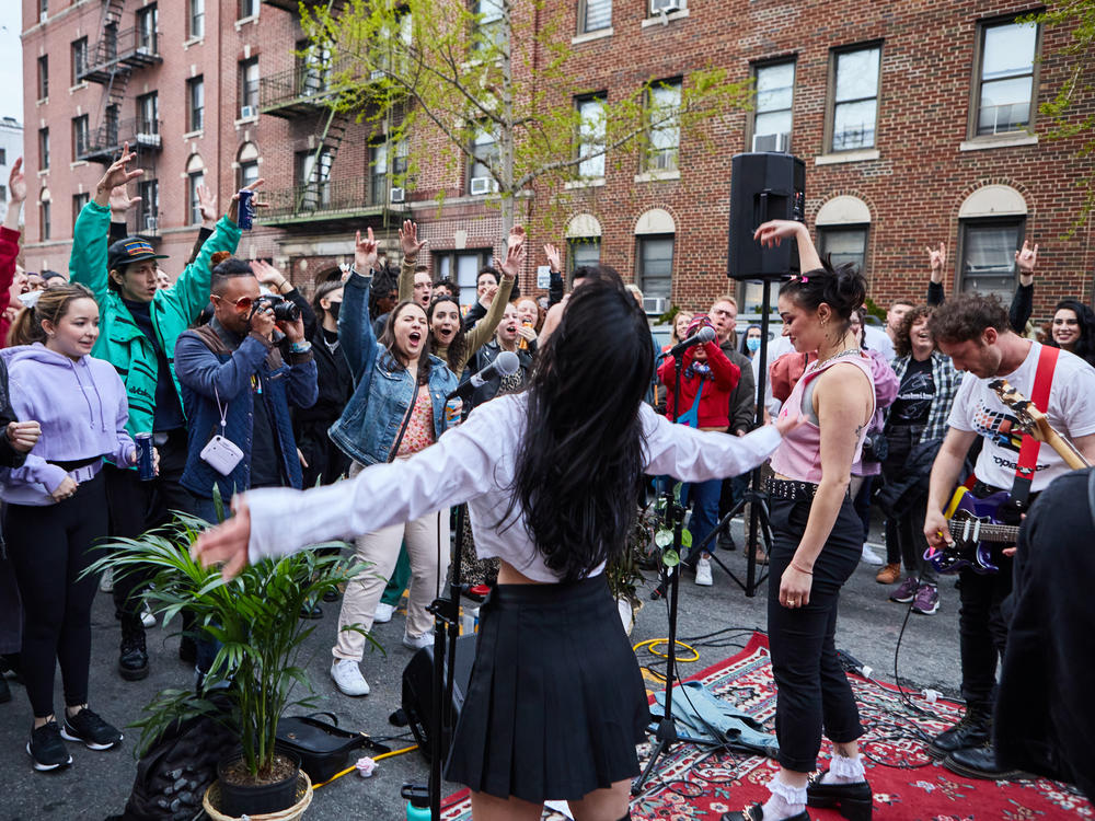 The band Daisy Grenade performs on Earth Day.