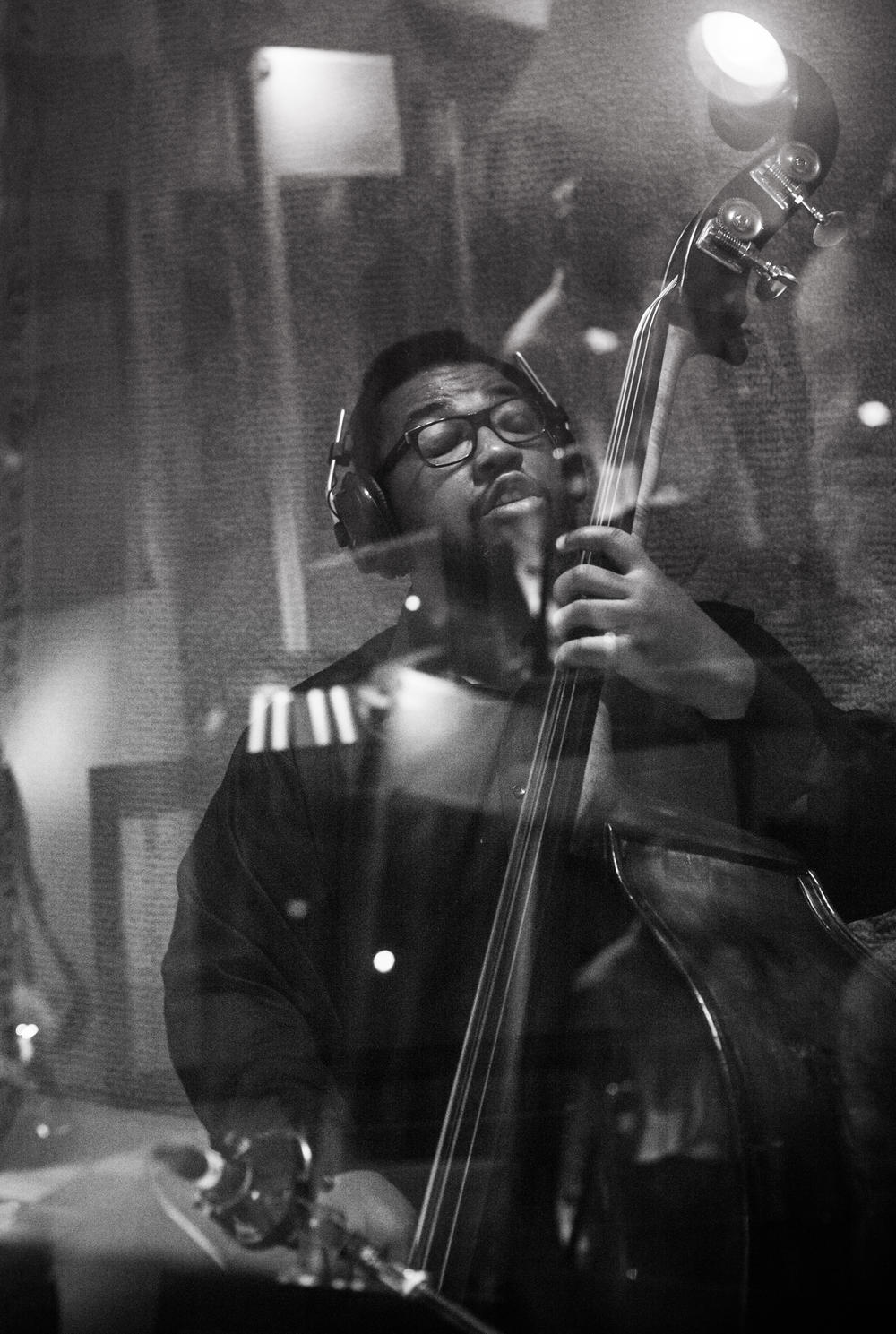 Dezron Douglas plays bass, for The Baylor Project album 