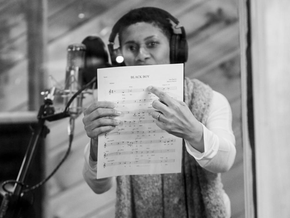 Jean Baylor pointing to the next song on the list, for the Baylor Project album 