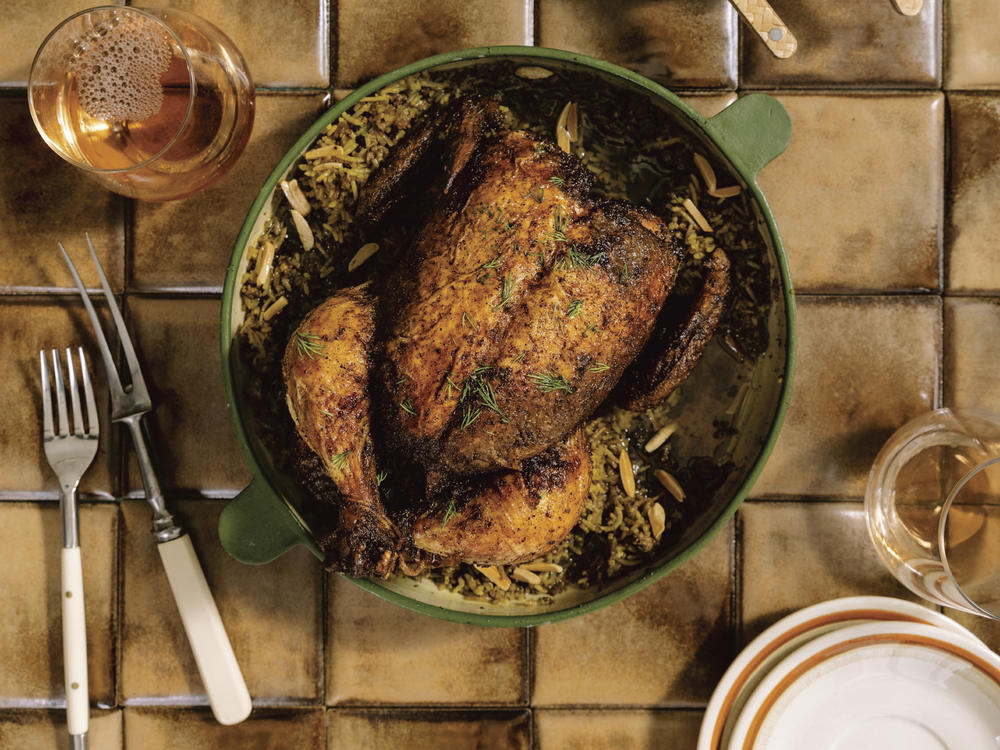 Many Eid meals include a main dish for the table like this Djaj Mahshi or chicken stuffed with spiced rice.