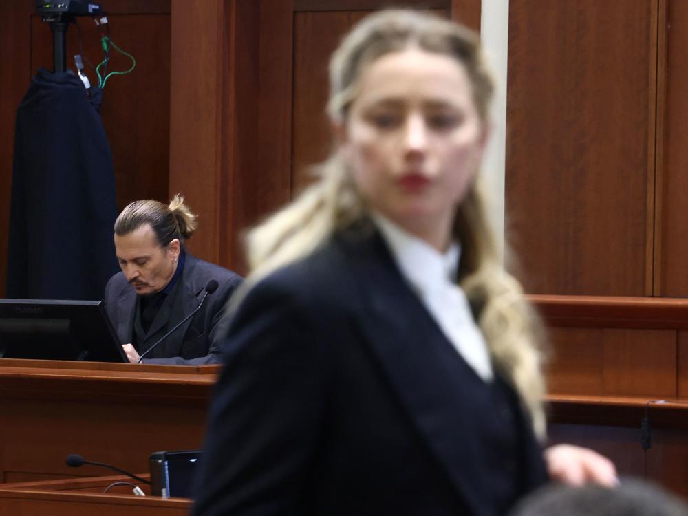 Amber Heard has filed a countersuit against Johnny Depp, seeking $100 million in damages and saying his legal team falsely accused her of fabricating claims against Depp. The former couple are seen here in court last week.