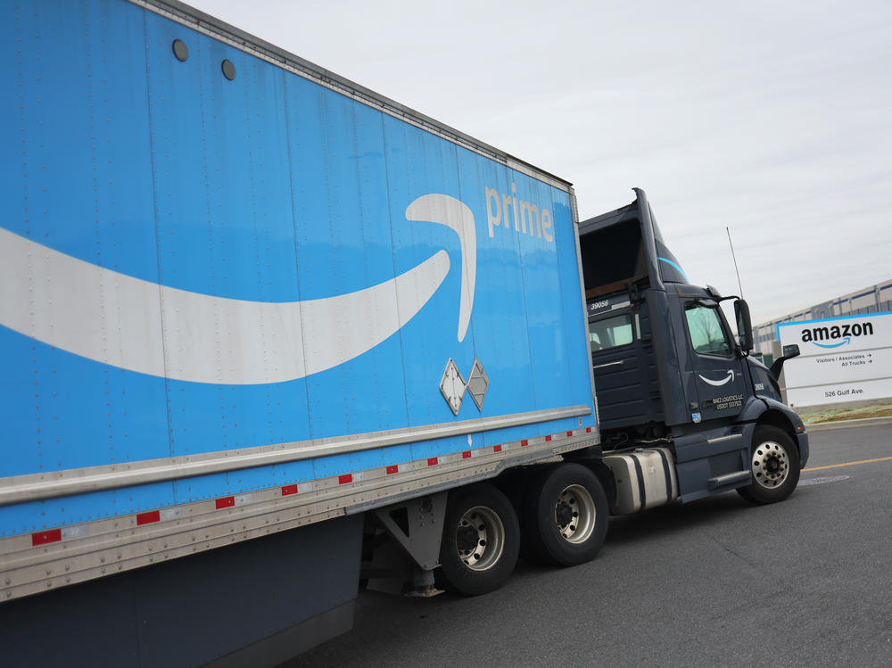 An Amazon truck is seen entering a warehouse in New York City on April 25. Amazon this week posted its first quarterly loss since 2015.