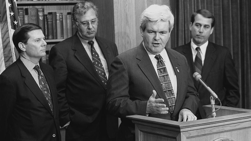 Then-House Speaker Newt Gingrich, R-Ga., at podium, and Majority Whip Tom DeLay, R-Texas, Majority Leader Dick Armey, R-Texas, and (future House Speaker) John Boehner, R-Ohio in 1995.