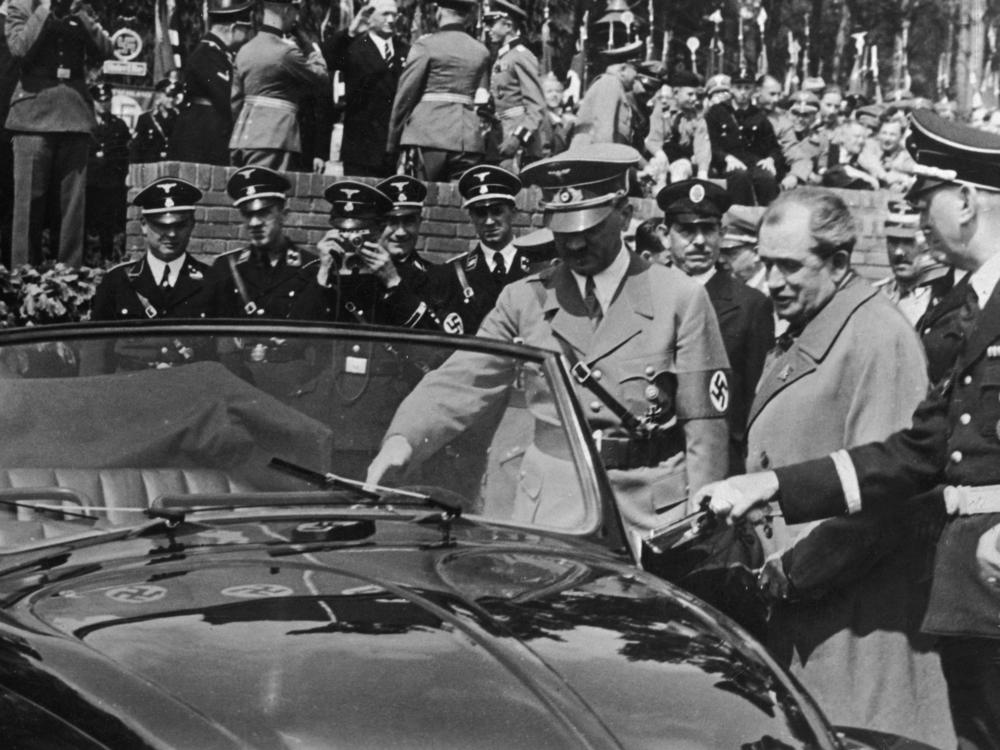 Adolf Hitler inspects the new Volkswagen 
