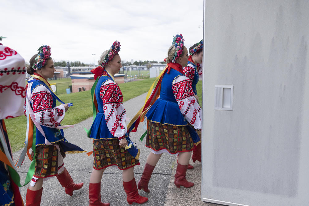 The Voloshky Ukrainian dance ensemble members arrive for their final dance number.