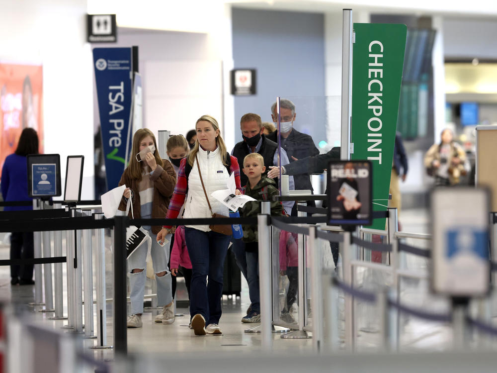 Airline passengers prepare to enter a security checkpoint at San Francisco International Airport on April 19.