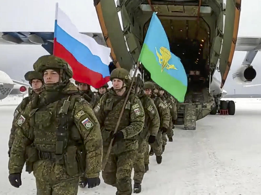 Russian troops arrive back in the Russian city of Ivanovo on Jan. 15 after serving briefly in the former Soviet republic of Kazakhstan. The Russian forces were dispatched to help Kazakhstan's President Kassym-Jomart Tokayev stamp out widespread protests against his authoritarian rule. Kazakhstan is just one of five former Soviet republic where Russian troops have been operating this year.