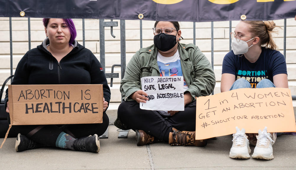 Abortion-rights supporters gather at the Supreme Court on Tuesday.