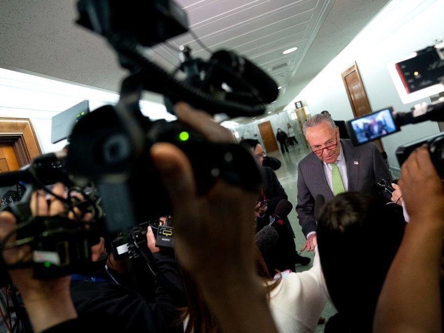 Senate Majority Leader Chuck Schumer, D-N.Y., speaks to reporters April 27 outside the Senate Judiciary Committee on Capitol Hill in Washington.