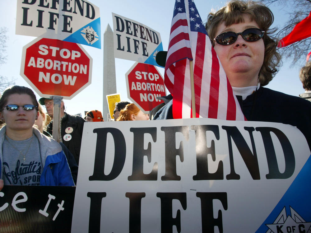 Activists Lori Gordon (R) and Tammie Miller (L) of Payne, Ohio, take part in the annual 