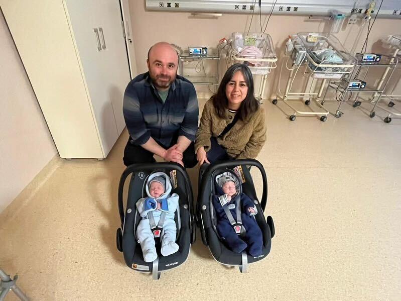 Alex and Irma with their twins.