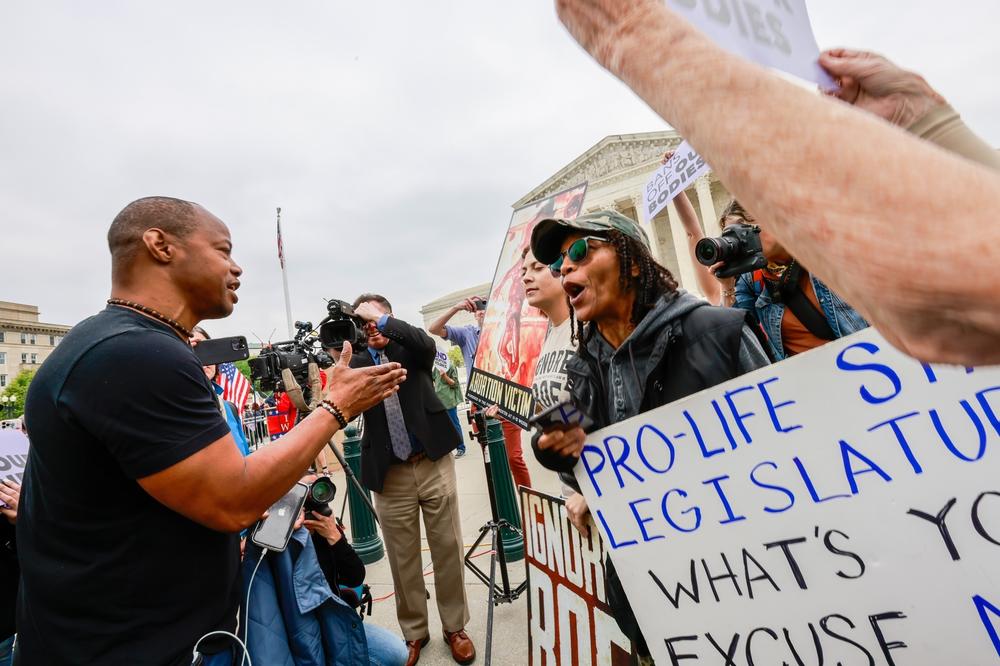 Anti-abortion rights protesters singing and chanting anti-abortion slogans outside the U.S. Supreme Court in Washington, D.C.