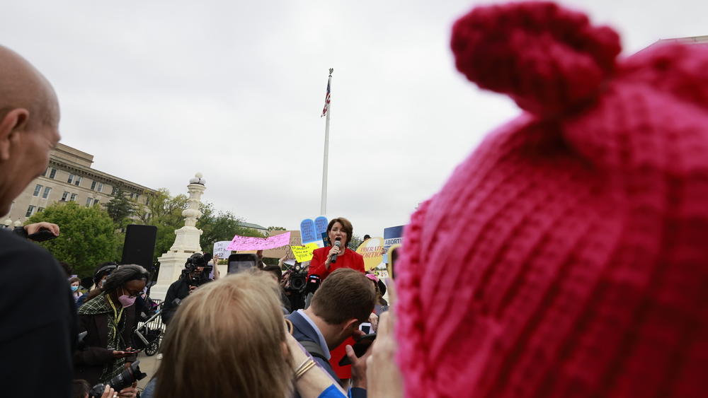 Sen. Amy <strong></strong>Klobuchar, D-Minn., speaks among abortion-rights supporters outside the U.S. Supreme Court.