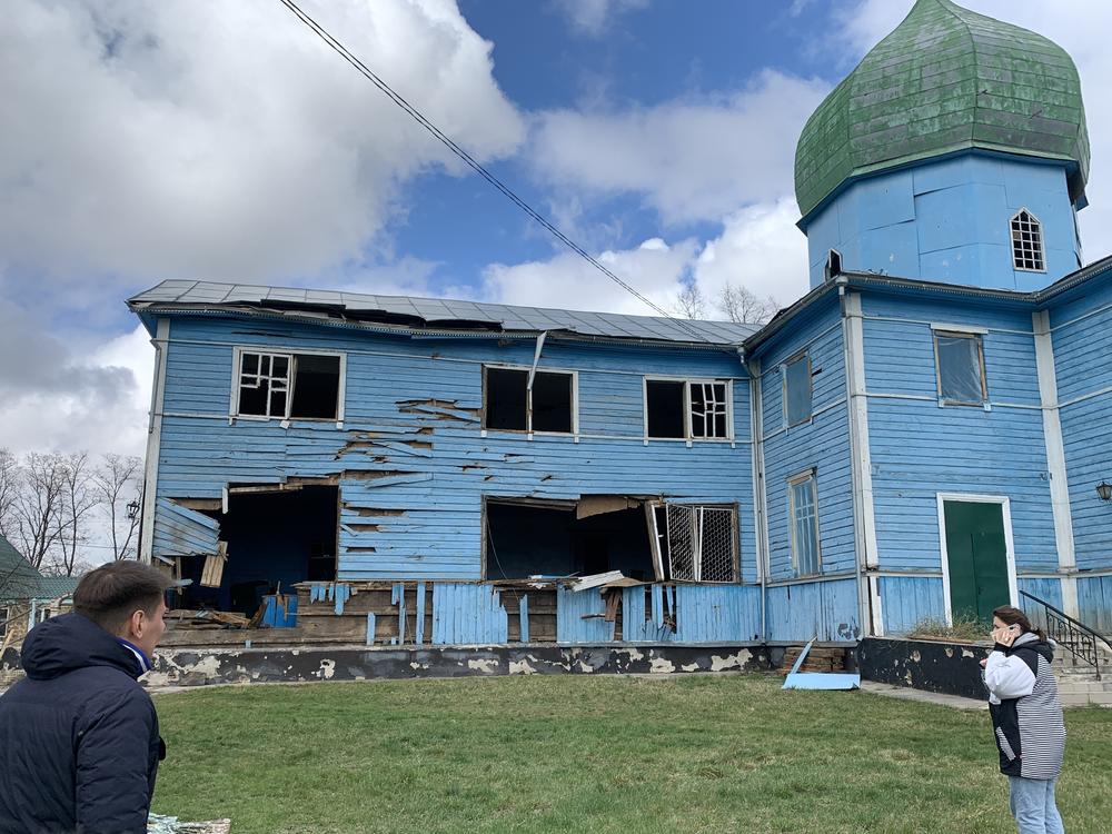 Sasha Romantsova, executive director of the Kyiv-based Center for Civil Liberties, visits an Orthodox church bombed by Russians in Peremoha, Ukraine, on April 17.