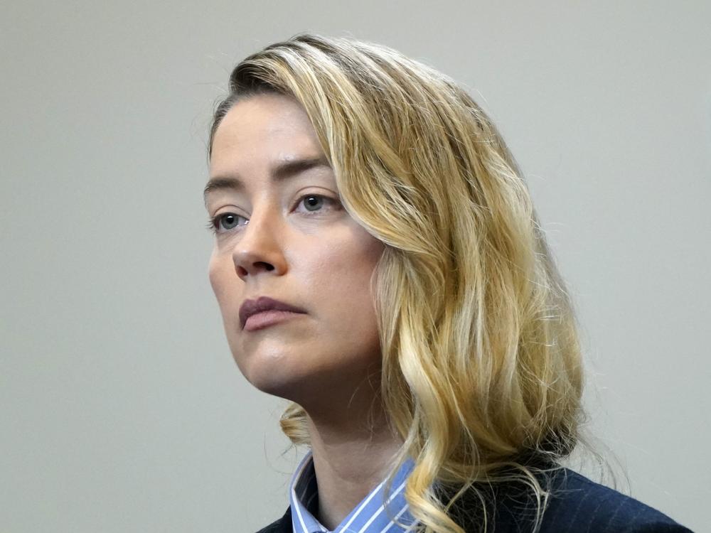 US actress Amber Heard returns to the courtroom after a lunch break at the Fairfax County Circuit Court in Virginia on Wednesday.