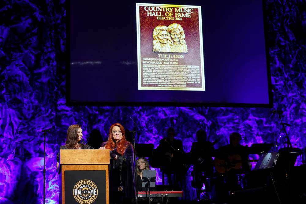 Ashley Judd (left) and Wynonna Judd speak during the medallion ceremony at the Country Music Hall of Fame and Museum on May 01, 2022 in Nashville, Tenn.