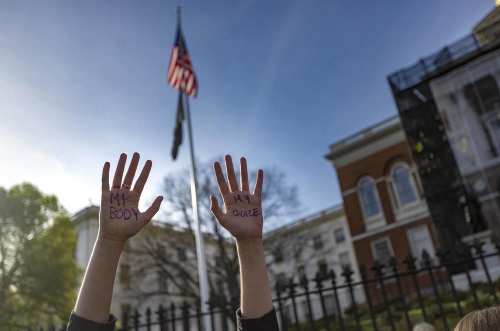 <strong>BOSTON:</strong> A protester with the words, 'MY BODY, MY CHOICE' written on the palms of her hands at the Defend Abortion Rights rally at the Massachusetts State House.
