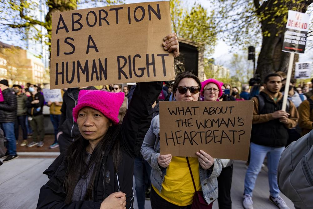 <strong>BOSTON</strong>: Kha Dickerman, left, joined thousands of others to rally to defend abortion rights at the Massachusetts State House.