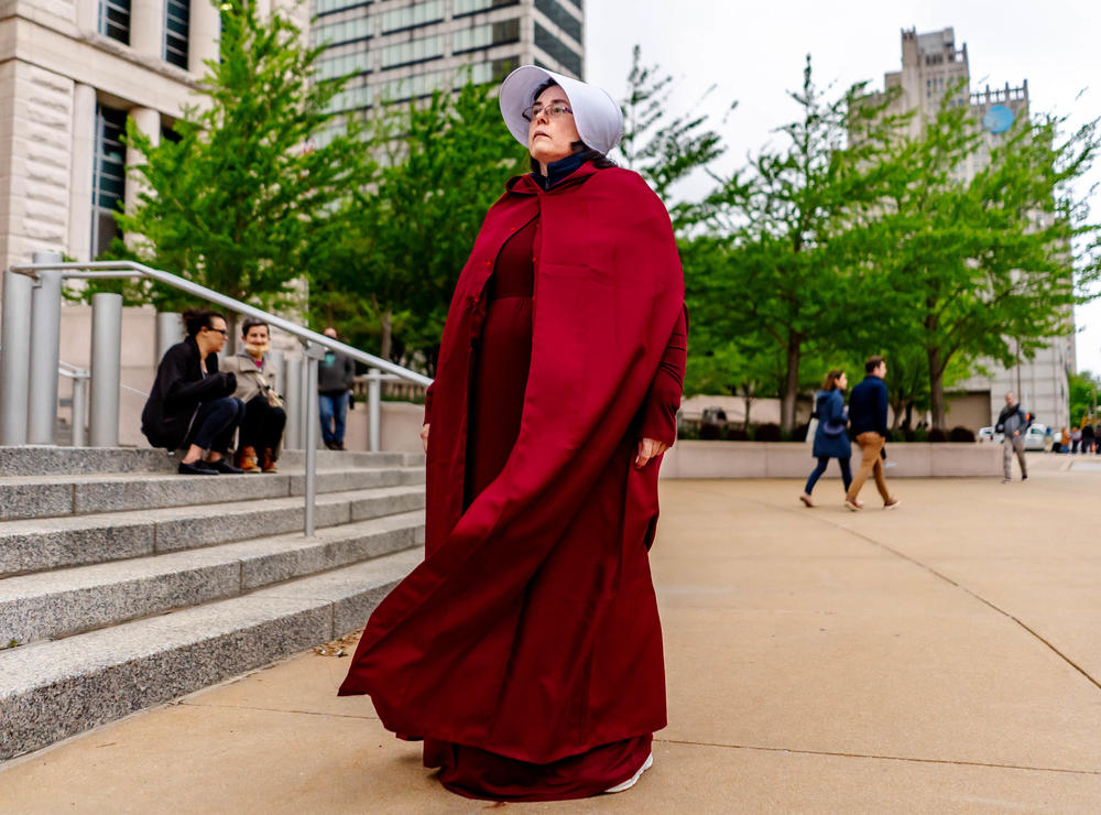 <strong>ST. LOUIS:</strong> Ericka Murphy, of Eureka, attends a demonstration rallying for abortion rights while dressed in a Handmade's Tale costume at the Thomas F. Eagleton U.S. Courthouse in downtown St. Louis.
