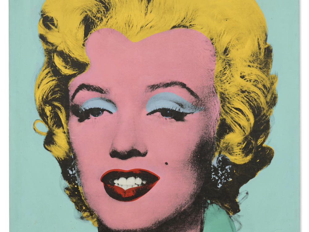 Andy Warhol's <em>Shot Sage Blue Marilyn</em> has set a record as the highest-priced American work of art to be sold at auction.