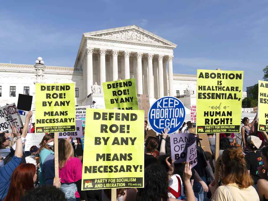 Demonstrators protest outside of the U.S. Supreme Court Tuesday, May 3, 2022 in Washington.
