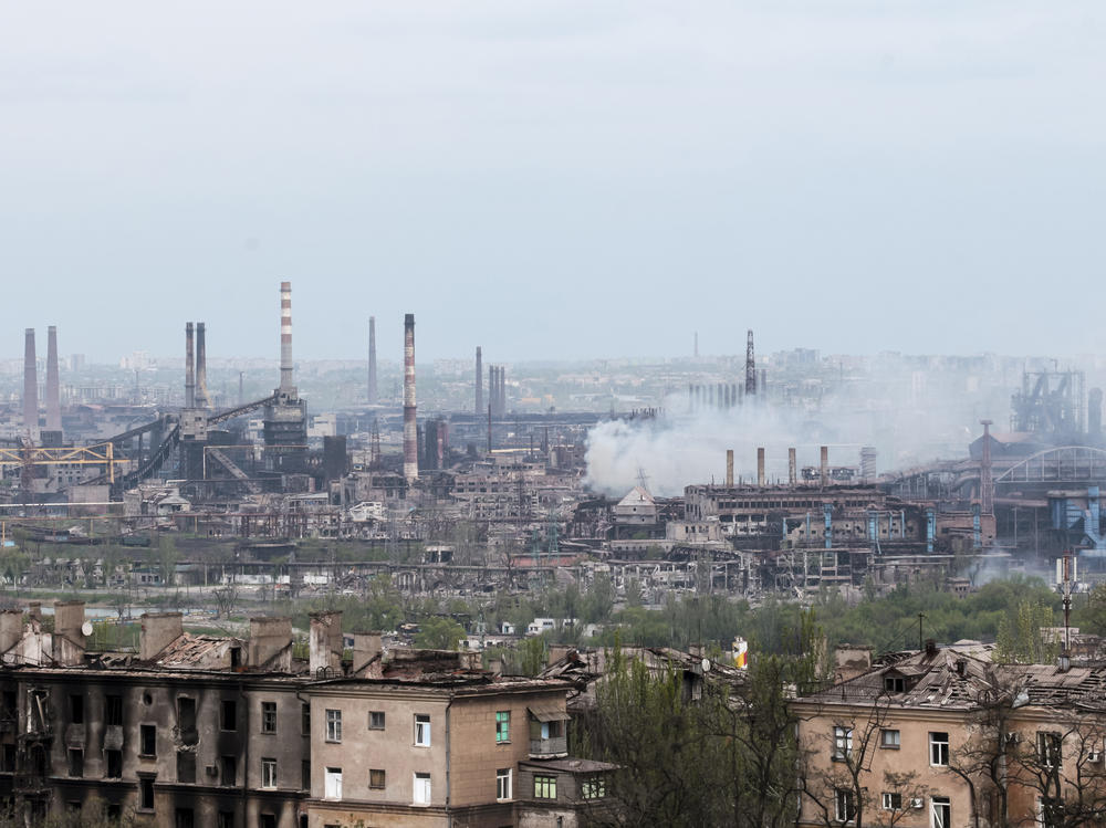 Smoke rises from the Metallurgical Combine Azovstal in Mariupol, eastern Ukraine, on Thursday. Heavy fighting is raging at the besieged steel plant as Russian forces attempt to finish off the city's last-ditch defenders and complete the capture of the strategically vital port.