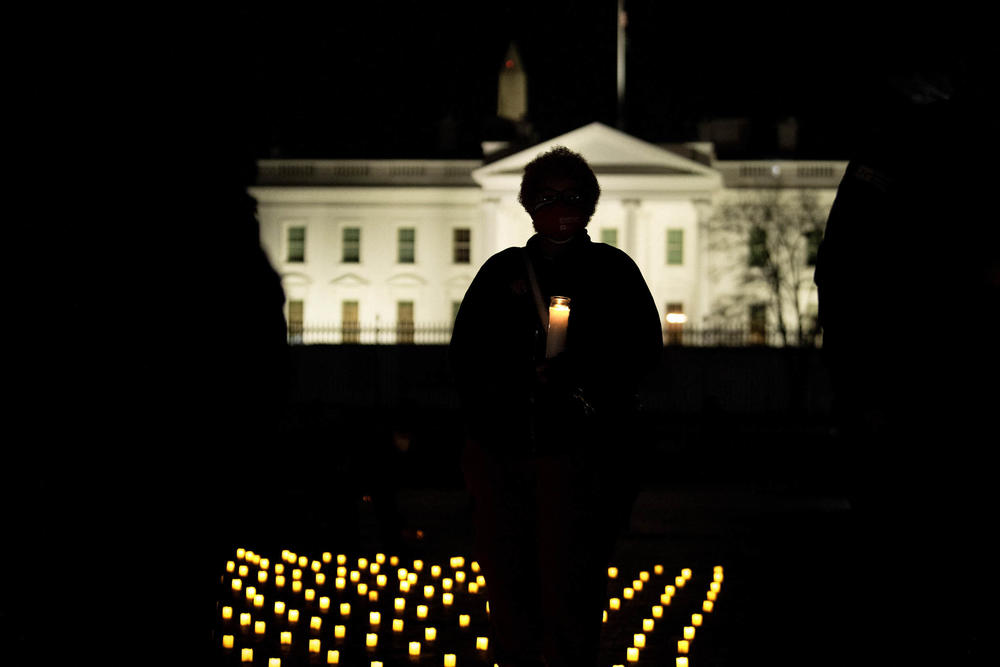 A candlelight vigil in Washington, D.C., in January 2022 honors nurses who died during the COVID-19 pandemic.