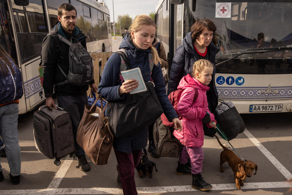 Evacuees from Mariupol arrive in Zaporizhzhia on Tuesday.
