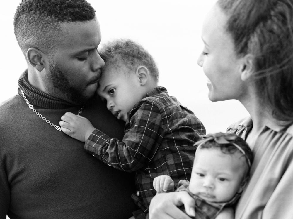 Anna Malaika Tubbs with her husband Michael Tubbs and their children