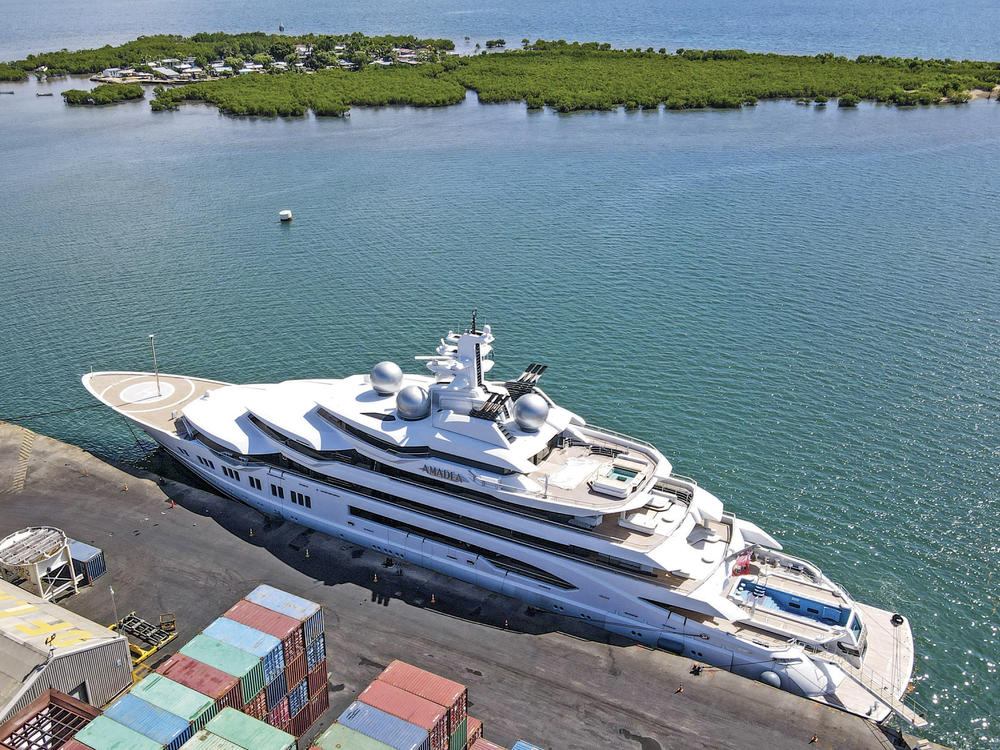 The superyacht Amadea is docked at the Queens Wharf in Lautoka, Fiji, on April 15. The vessel, which U.S. authorities say is owned by a Russian oligarch previously sanctioned for alleged money laundering, has been seized by law enforcement in Fiji, the U.S. Justice Department announced Thursday.