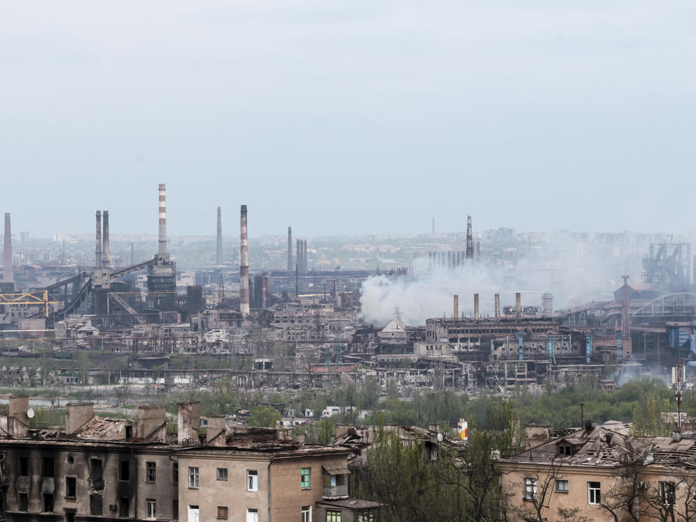 Smoke rises from the Metallurgical Combine Azovstal in Mariupol, in territory under the government of the Donetsk People's Republic, eastern in Mariupol, Ukraine, Thursday, May 5, 2022.