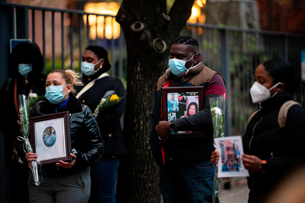 Nurses and health care workers outside Mount Sinai Hospital in New York City remember their colleagues who died during the first wave of the coronavirus outbreak in April 2020.