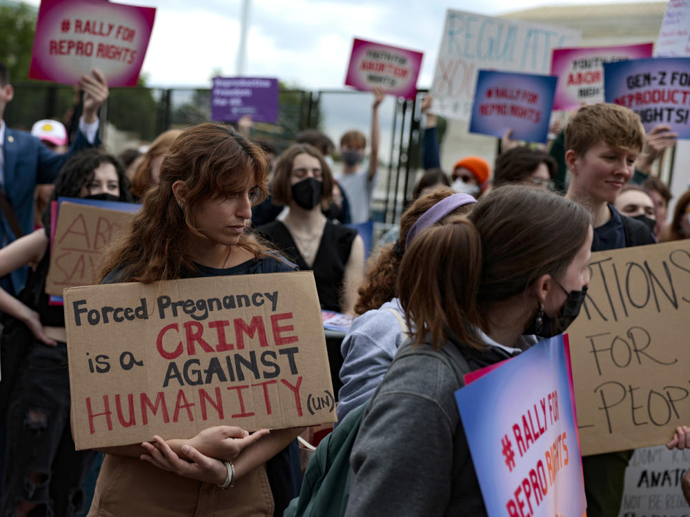 Abortion rights activists attend a rally in front of the Supreme Court building on Thursday. Abortion-rights funds and health clinics that perform abortions across the country have seen an outpouring of support since the Supreme Court's draft decision was leaked Monday.